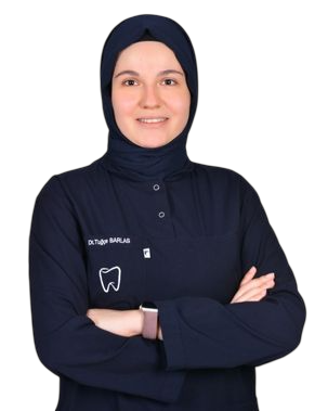 Dr. Tuğçe Barlas at Afyon Ballıpınar Dental Polyclinic – preventive and aesthetic dental treatments.